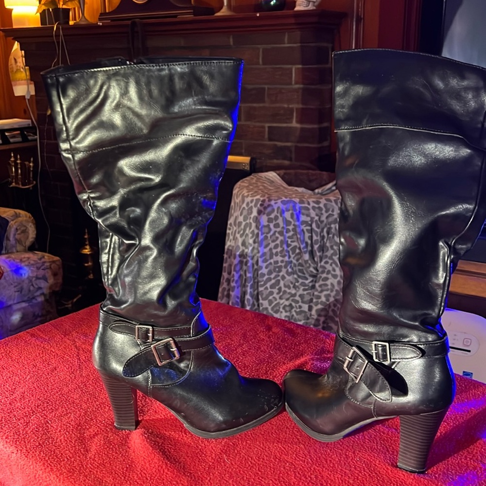 Tall black leather boots
